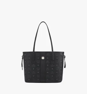 M.C.M REVERSIBLE SHOULDER BAG